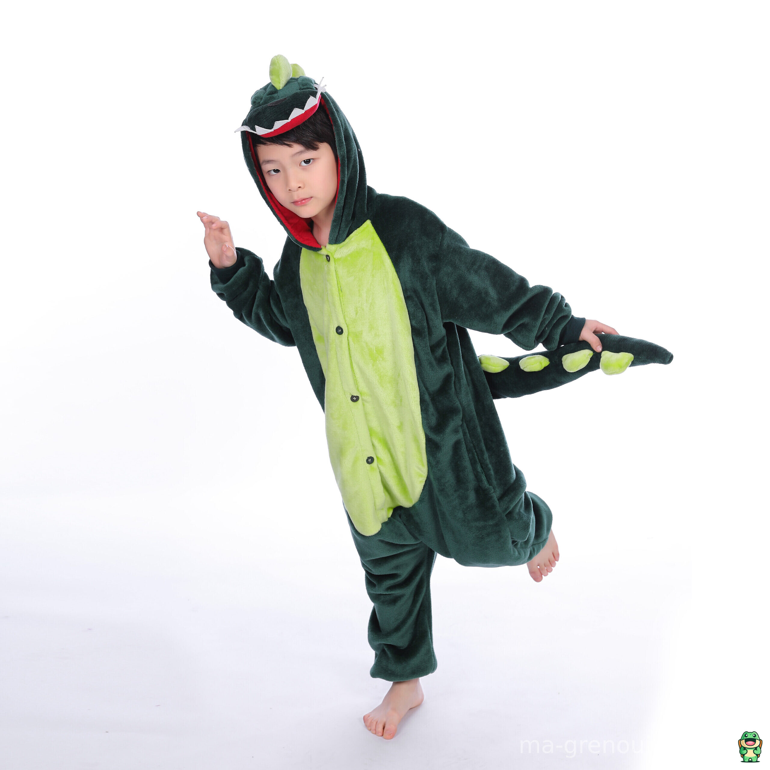Vue de face de la grenouillère dinosaure enfant verte